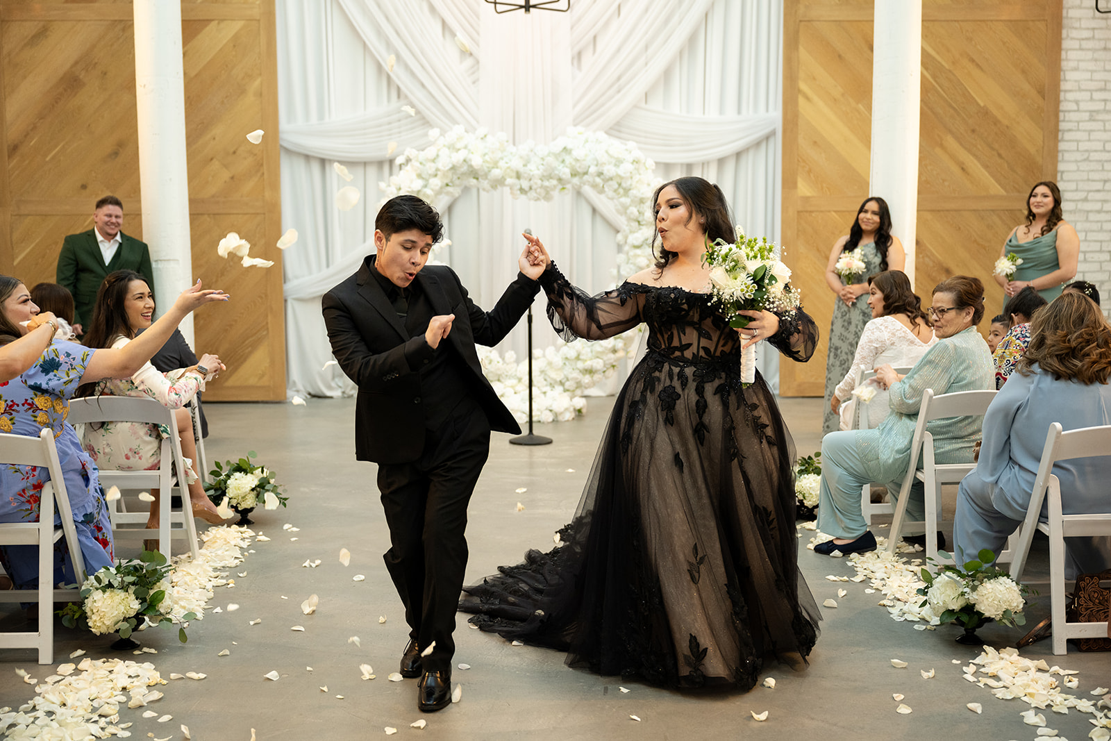 Couple dances down aisle at Carlsbad California wedding